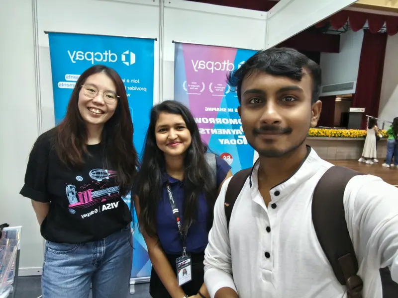 Prathamesh Halale with the dtcpay team at their booth during an industry event at INTI, Malaysia