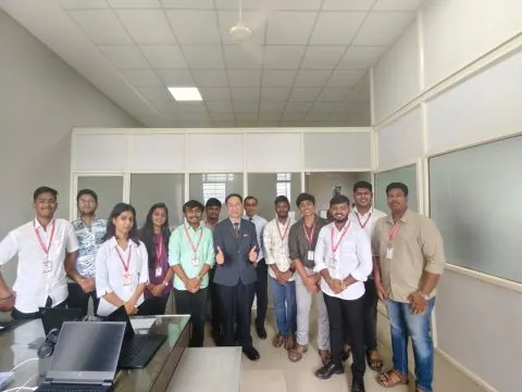 Prathamesh Halale and the NextIn team with a visiting guest from Taiwan at the NextIn office