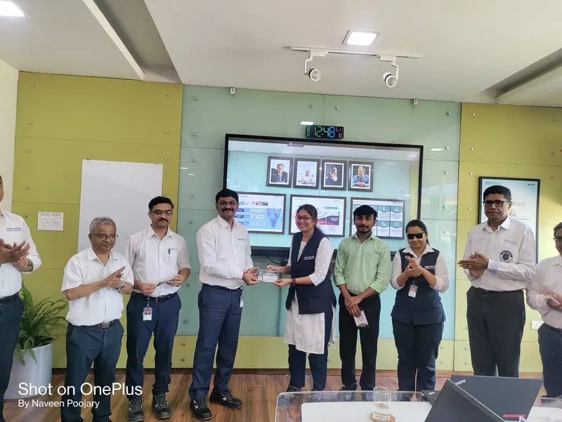 Prathamesh Halale with the Tata Motors team at an event in a conference room at Tata Motors, Dharwad